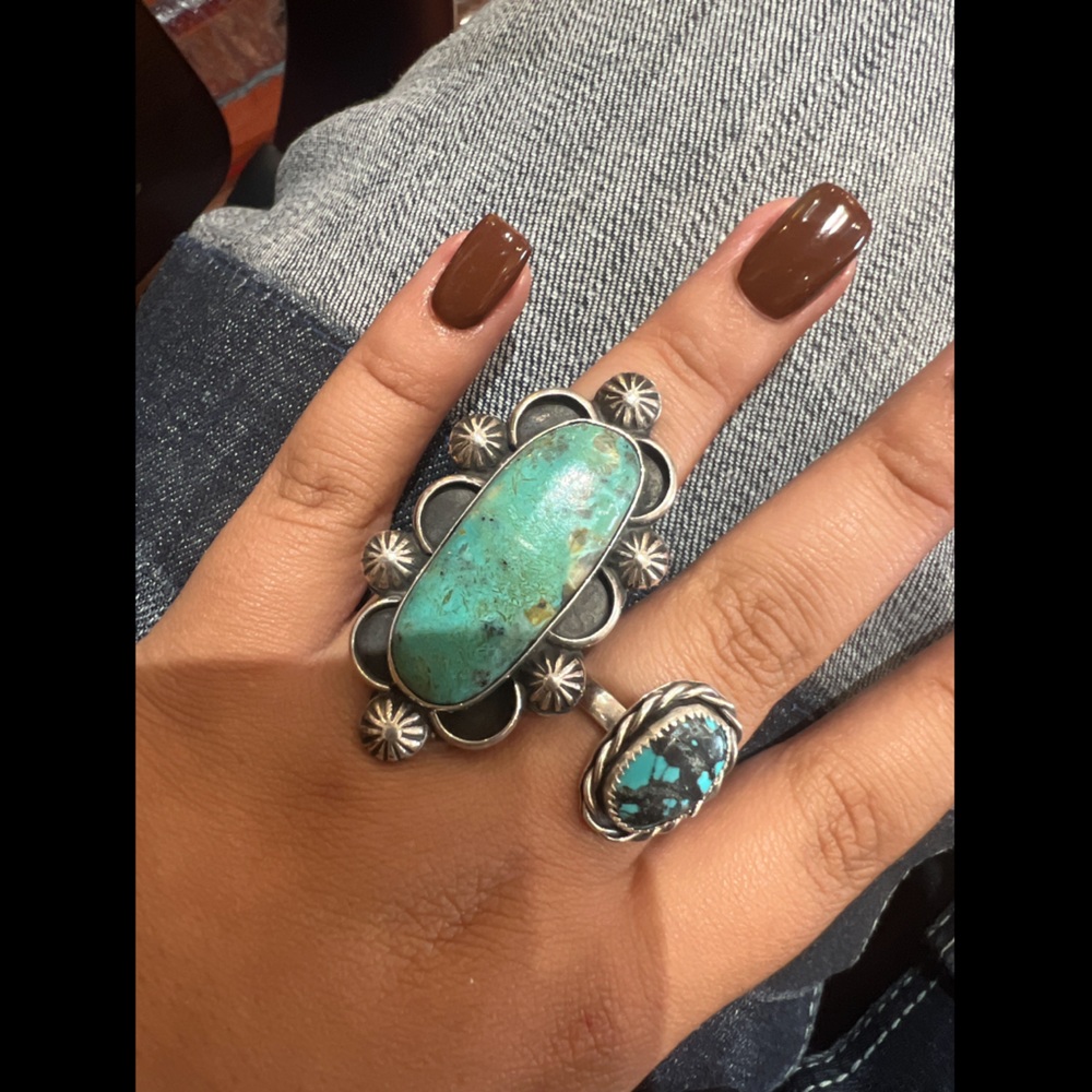 Turquoise ring on the left is a size 6.5 and stamped.